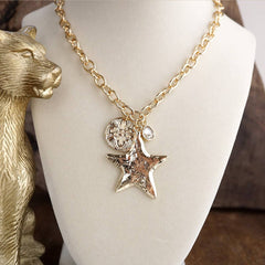 Gold Star Mixed Charm Statement Necklace
